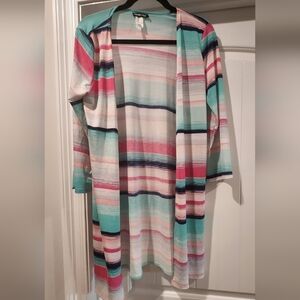 Cute cover or lightweight sweater if you choose to call it that